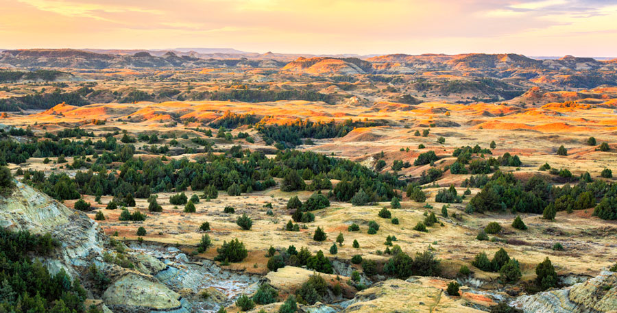 View of sunrise over Theodore Roosevelt National Park
