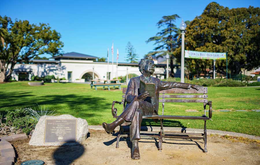 View a Mark Twain statue in front of the Monrovia Library