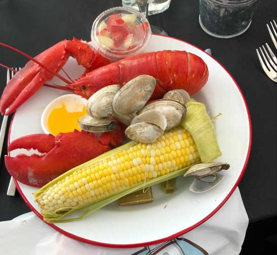 A seafoods with a corn on a plate