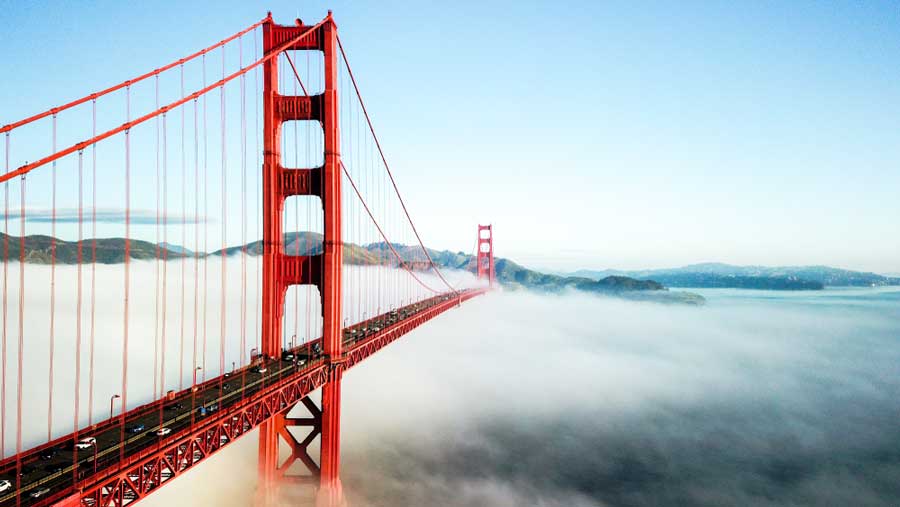 View of the Golden Gate Bridge over a fog