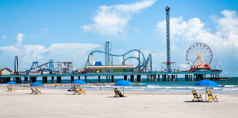 The Pleasure Pier Amusement Park from afar under the clear blue sky