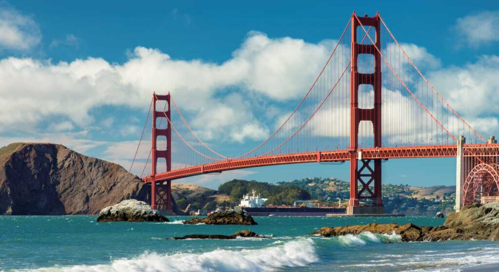 View of the Golden Gate Bridge under the clear blue sky, one of the things California is Known and Famous For