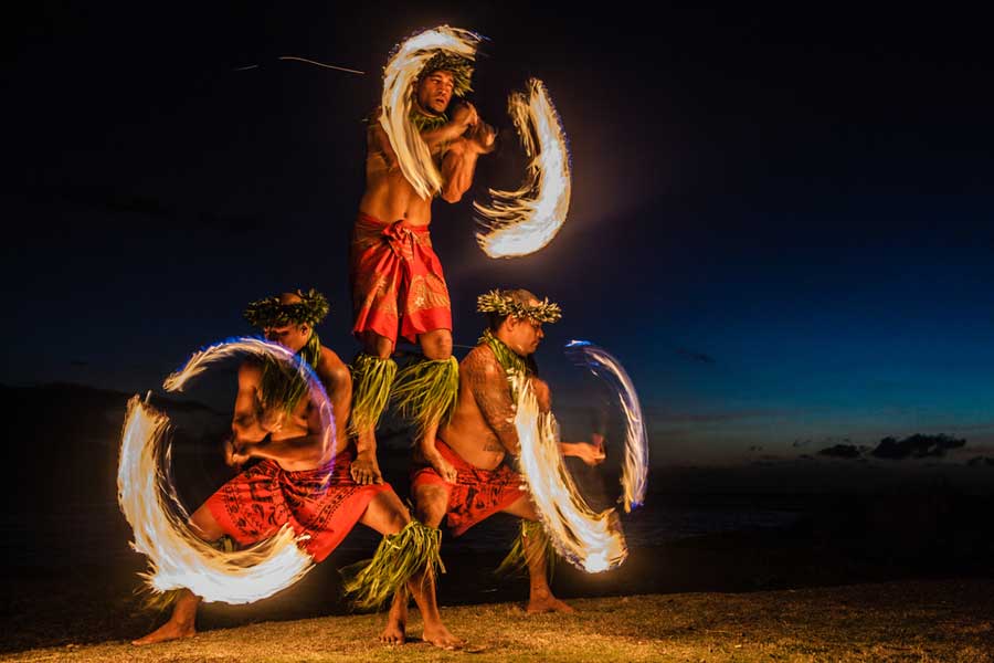 View of fire dancers performing in luau