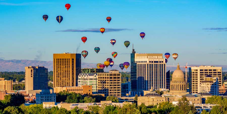 Hot air balloons over the buildings in Boise