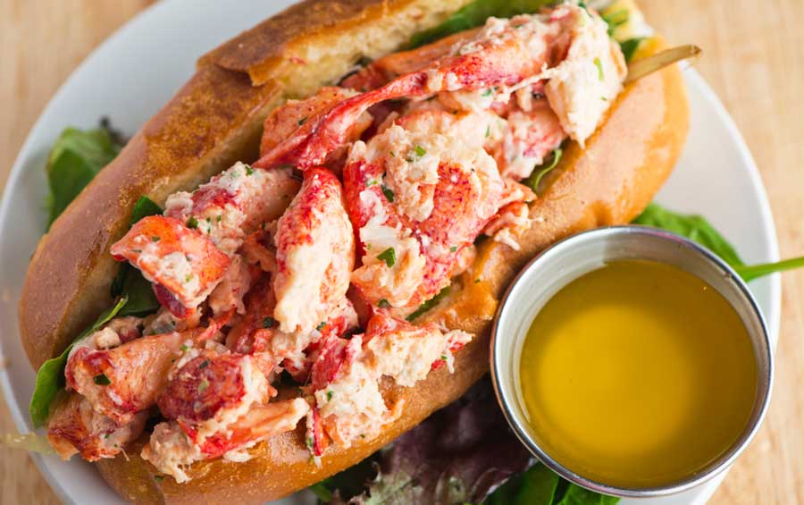 A lobster roll sandwich on a plate