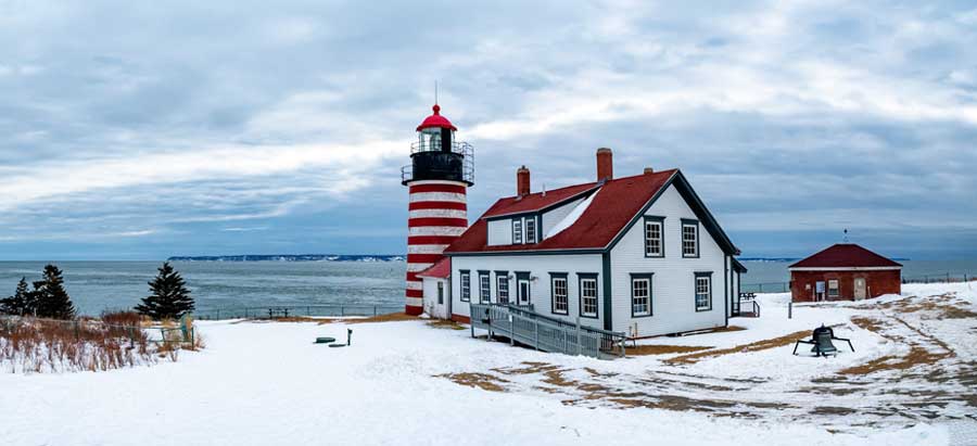 The West Quoddy Head Lighthouse during winter in Maine
