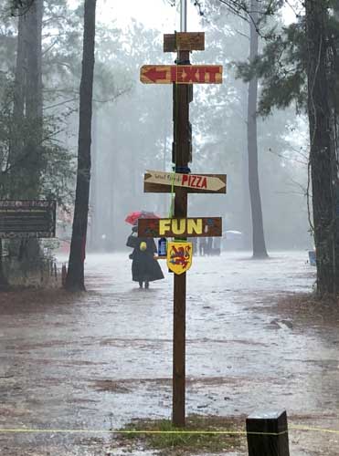 A woman walking on a street during a flood in Louisiana