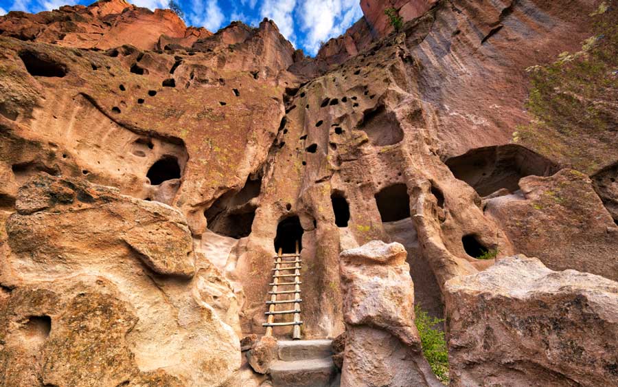 View of a stair and cliff dwellings in Bandelier National Monument