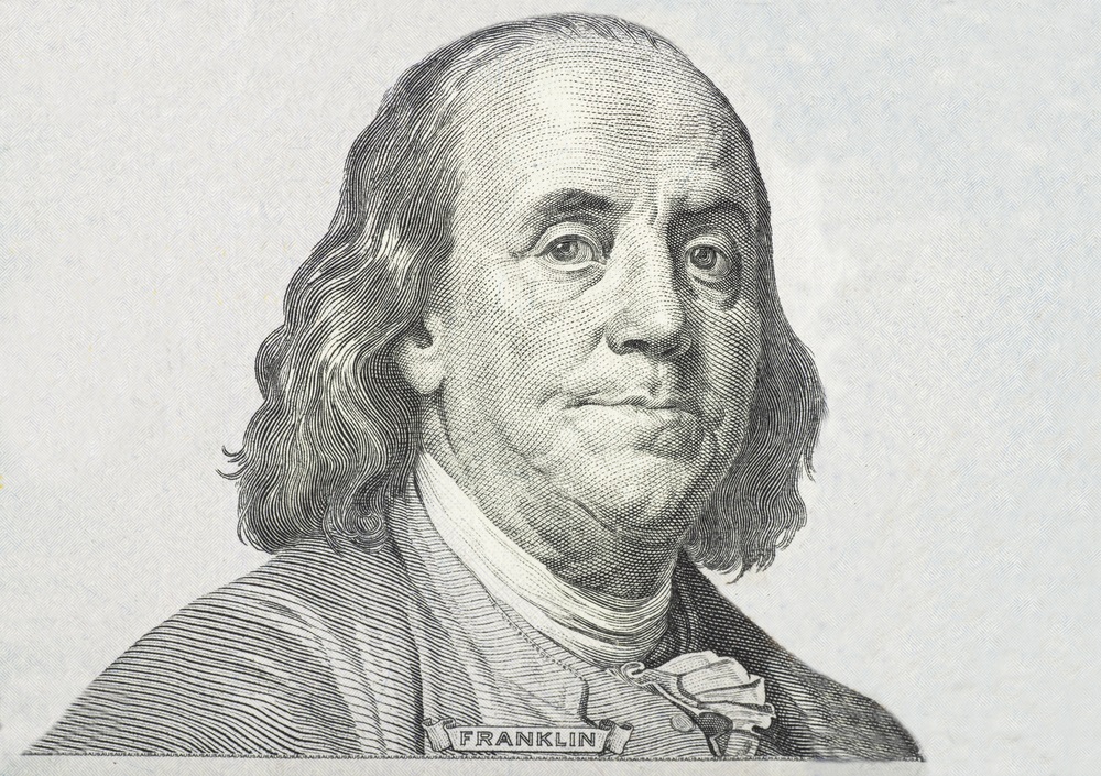 A close up portrait of Benjamin Franklin