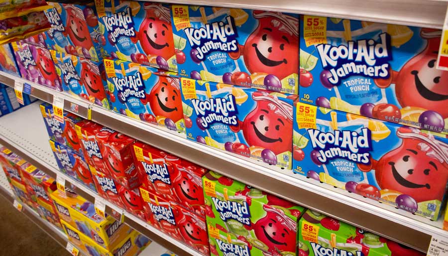 Kool-Aid on boxes displayed on a shelf in a store