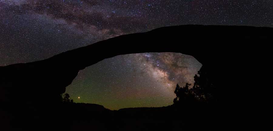 The Milky Way shining bright over the night sky in Natural Bridges National Monument