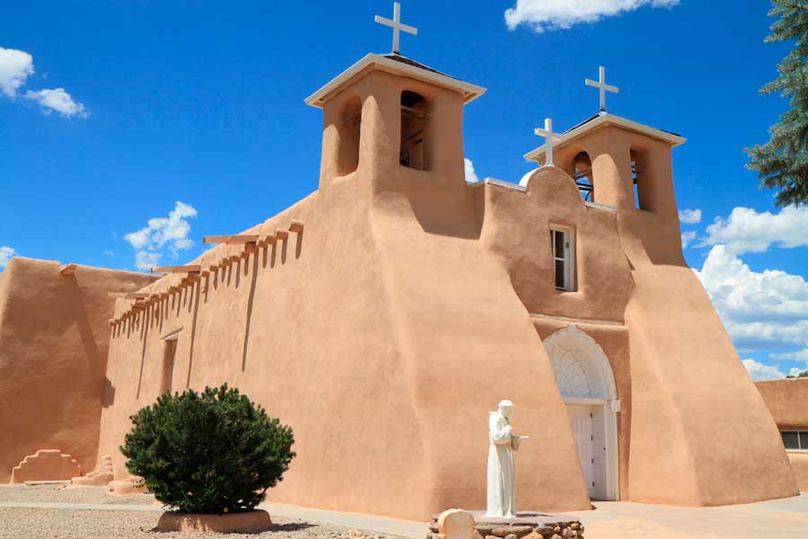 The St. Francis of Assisi mission church under the clear blue sky