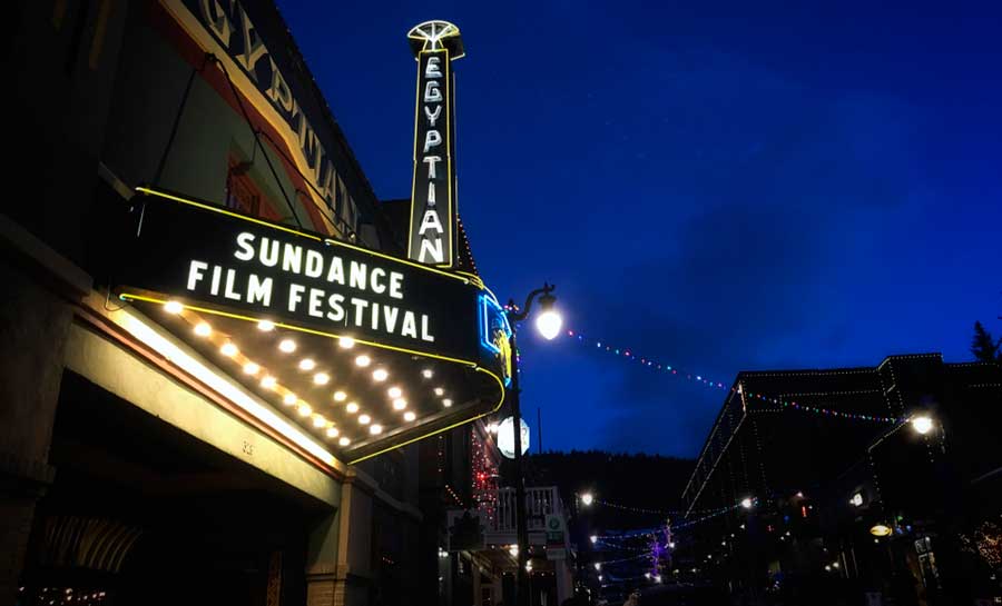The Sundance Film Festival sign with lights at night
