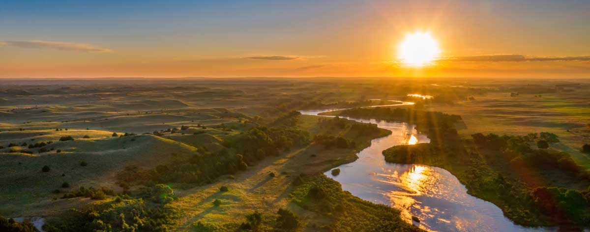View of sunrise over the Dismal River, one of the things Nebraska is known for