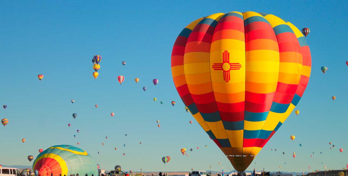 Colorful hot air balloons over New Mexico, one of the things that New Mexico is known for