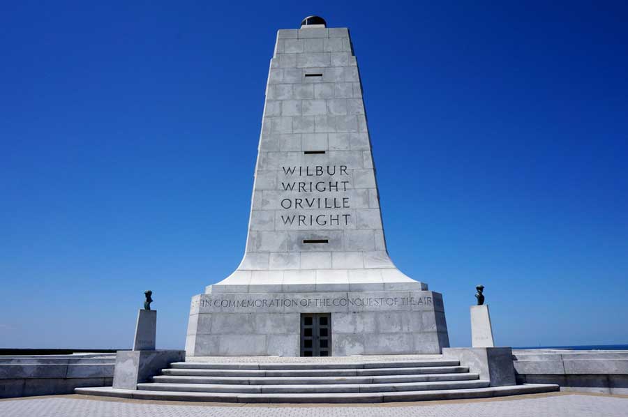 The Wright Brothers National Memorial under the clear blue sky in North Carolina