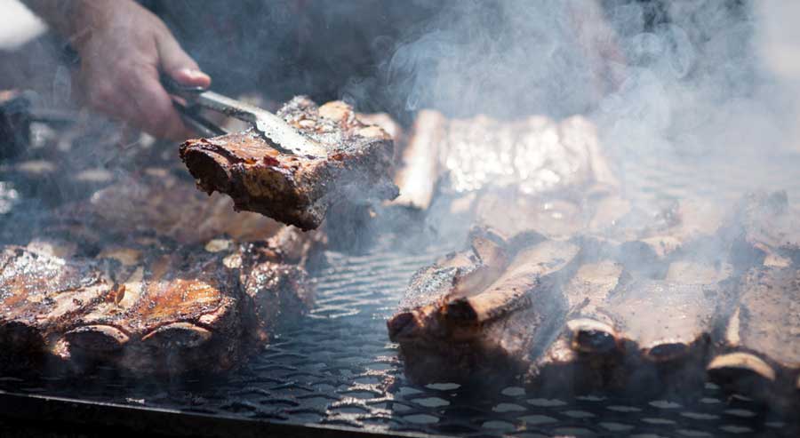 Ribs being cooked on the barbecue grill