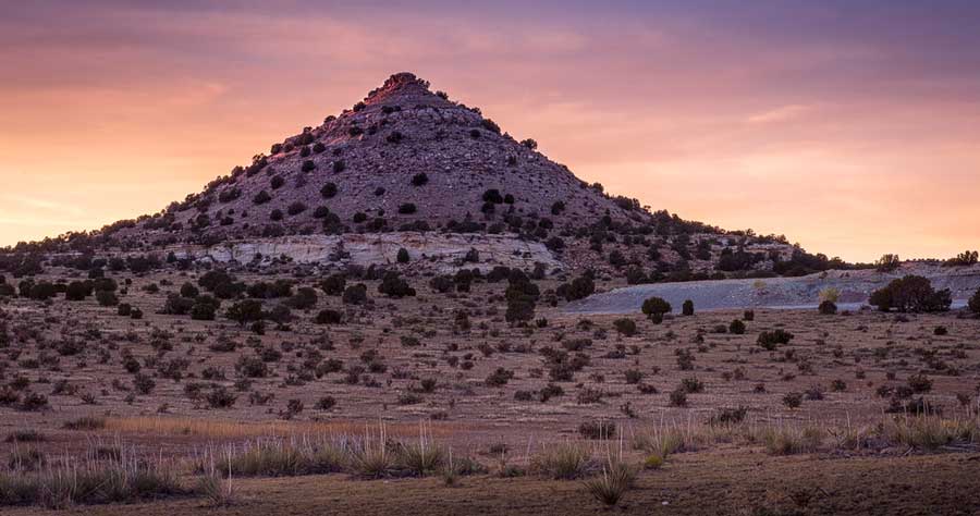 The Black Mesa in Oklahoma under the colorful sky during sunset