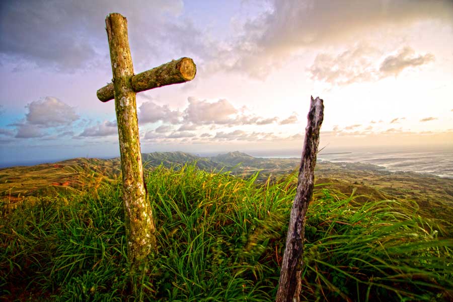 A wooden cross at the top of Mt. Lamlam