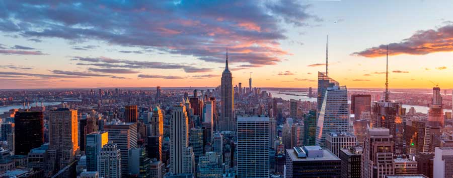 Panoramic view of New York City's skyline during sunset