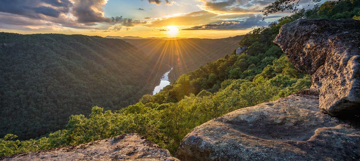 Scenic view from a mountain during sunset in West Virginia, one of the things West Virginia is known for