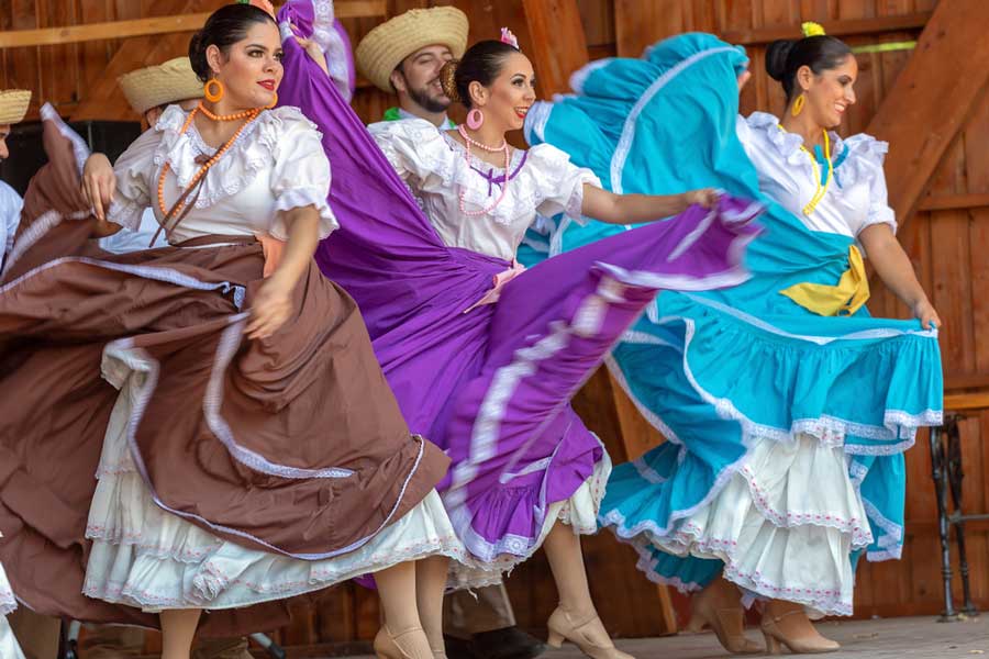 View of people dancing a traditional Puerto Rican dance