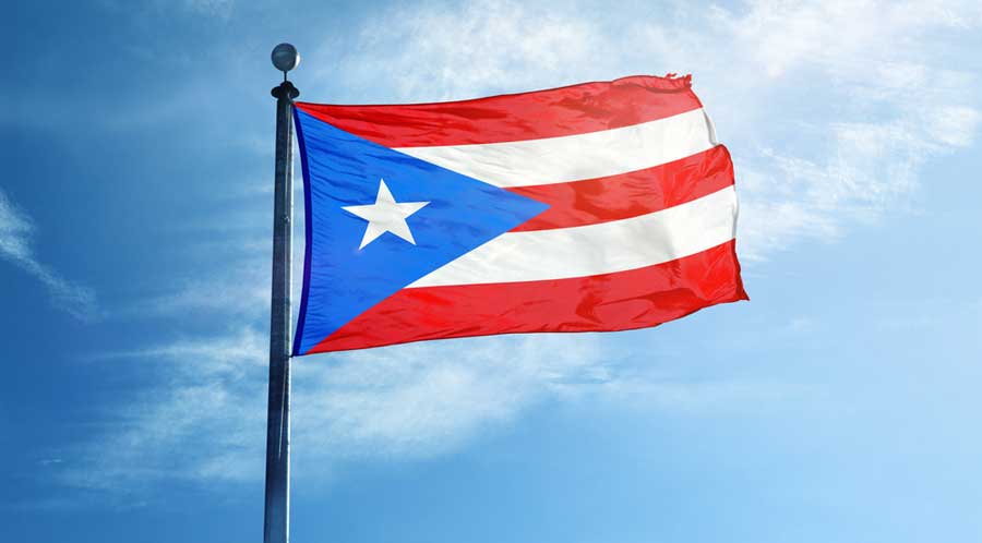 The flag of Puerto Rico on a flag pole