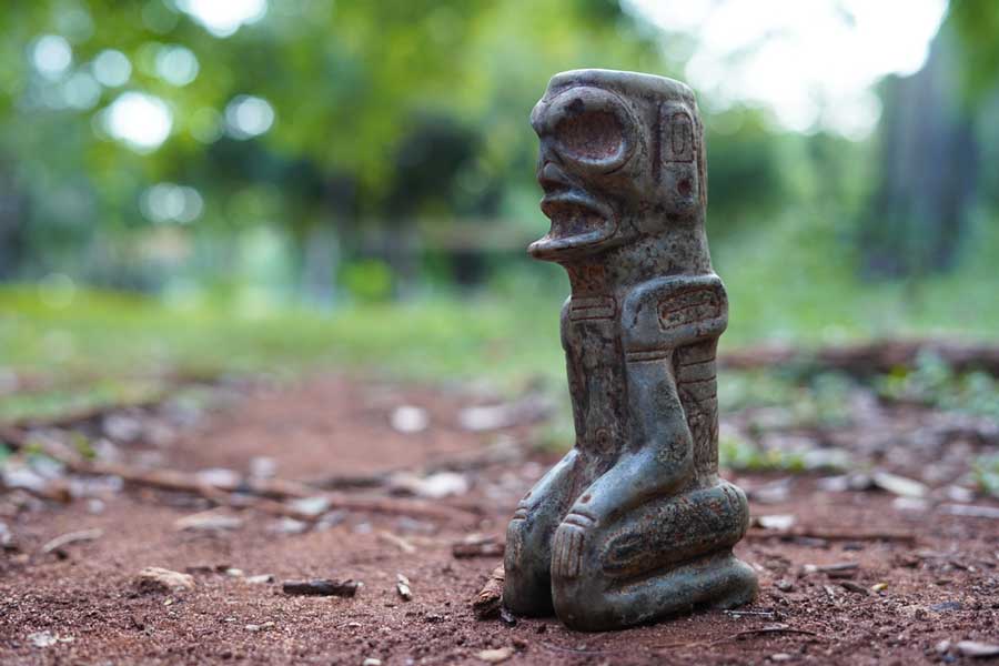 View of a sitting Taino antique stone idol